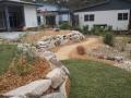 Seamist Close Murrays Beach Project Excavations & Levelling, Sandstone Boulder Walls, Charcoal Paving, Timber & Sandstone Steps, Lawns, Gardens & Decorative Gravels